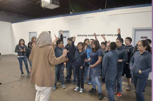 Students raise their hands